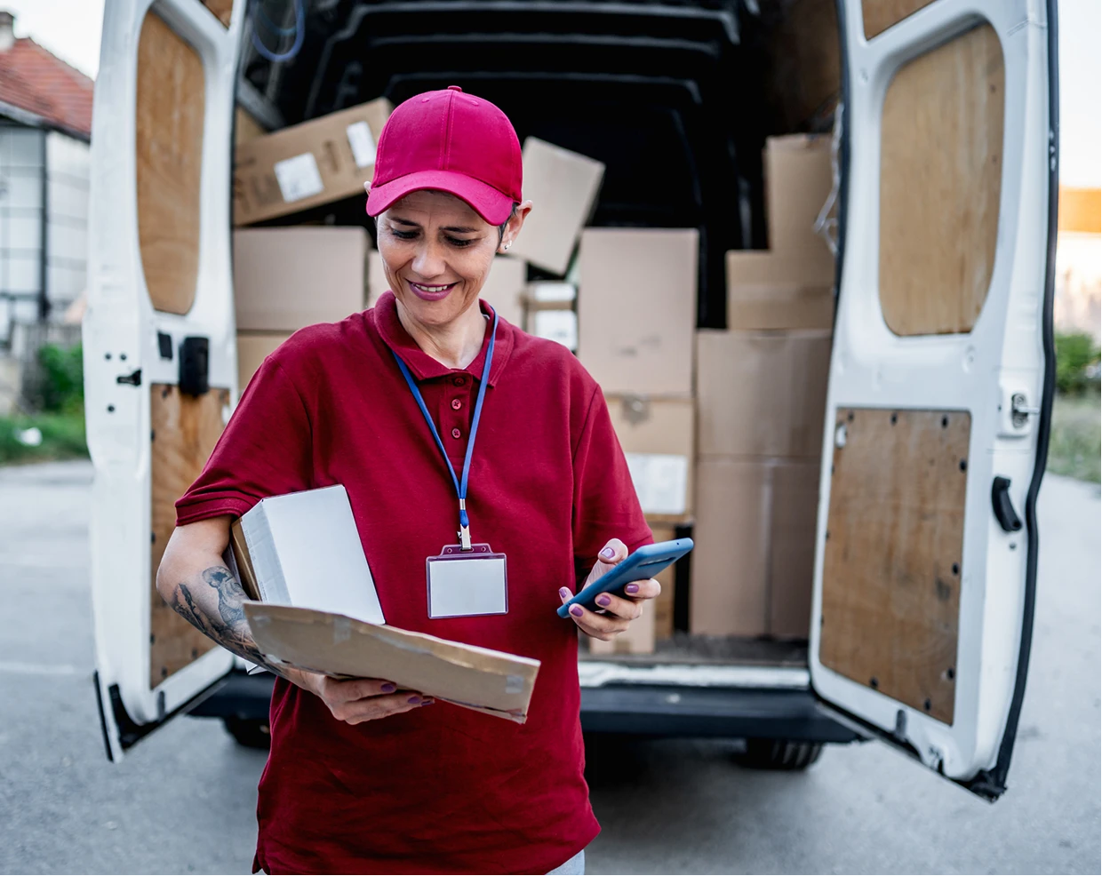 Courier using phone for delivery details